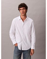 Calvin Klein - Camisa con botones Oxford clásica de color liso - Lyst