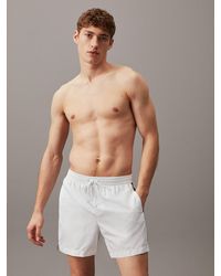 Calvin Klein - Medium Drawstring Swim Shorts - Logo Tape - Lyst