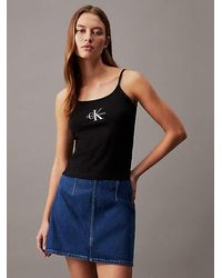 Calvin Klein - Top slim con monograma - Lyst