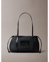 Calvin Klein - Embossed Monologo Satchel Bag - Lyst