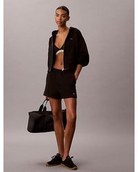 Calvin Klein - Jeans Relaxed Cotton Terry Jogger Shorts - Lyst