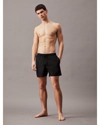 Calvin Klein - Short de bain mi-long avec cordon de serrage - CK Steel - Lyst