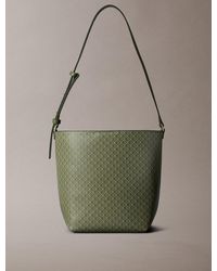 Calvin Klein - Allover Emblem Logo Bucket Bag - Lyst
