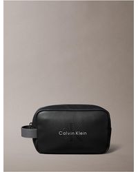 Calvin Klein - Embossed Monologo Dopp Kit - Lyst