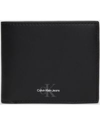 Calvin Klein - Portefeuille fin en cuir anti-RFID - Lyst