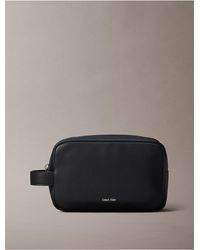Calvin Klein - Raised Logo Dopp Kit - Lyst
