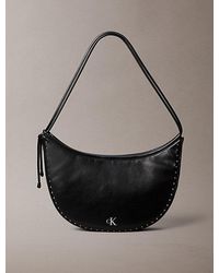 Calvin Klein - Convertible Studded Crescent Hobo Bag - Lyst