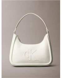 Calvin Klein - Embossed Monogram Logo Shoulder Bag - Lyst