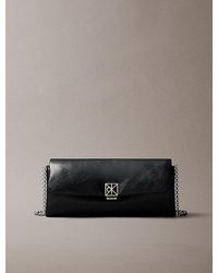 Calvin Klein - Padded Emblem Hardware Crossbody Clutch - Lyst