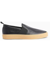 Calvin Klein Chaussures slip-on en cuir - Noir