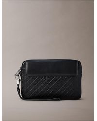 Calvin Klein - Allover Emblem Logo Pouch - Lyst