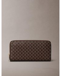 Calvin Klein - Allover Emblem Logo Zip Wallet - Lyst