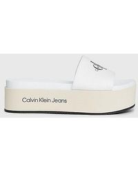 Calvin Klein - Plateau-Slippers aus Canvas - Lyst
