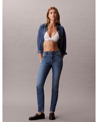 Calvin Klein - Mid Rise Slim Jeans - Lyst