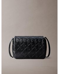 Calvin Klein - Puffer Emblem Logo Flap Crossbody Bag - Lyst