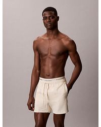 Calvin Klein - Double Logo Waistband Swim Shorts - Lyst