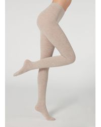 Mujer Ropa de Calcetines y medias Pantis veladas 20 deniers con línea en la parte de atrás Calzedonia de Algodón de color Negro 