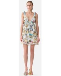 CAMILLA - Curved Hem Ruffle Dress Art For The Artisans - Lyst