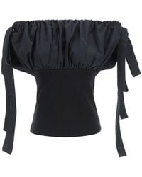 Alexander McQueen Short-sleeve tops for Women - Up to 74% off at 