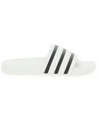 adidas Slippers for Men - Up to 43% off at Lyst.com