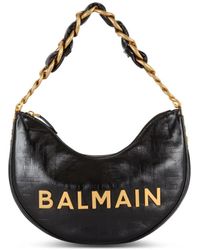Balmain - Borsa 1945 soft moon in pelle di vitello con monogramma - Lyst