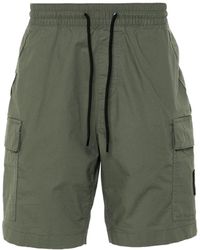 Calvin Klein - Calvin klein pantaloncini cargo con logo applicato - Lyst