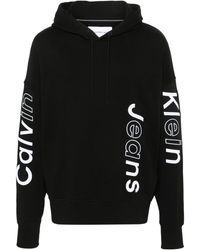 Calvin Klein - Calvin klein logo-embroidered cotton hoodie - Lyst