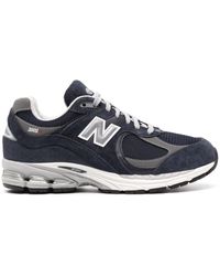 New Balance - Sneakers blu con lacci per uomo - Lyst