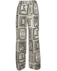 Acne Studios - All-over Printed Trousers - Lyst