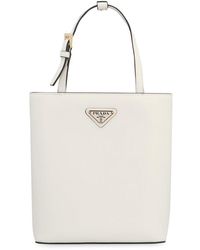Prada - Triangle Logo-appliqué Top Handle Bag - Lyst