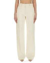 Valentino - All-over Logo Patterned Straight Leg Pants - Lyst
