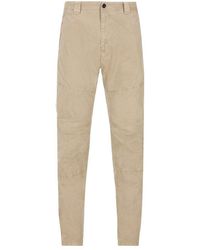 C.P. Company - Logo-patch Tapered Stretched Trousers - Lyst