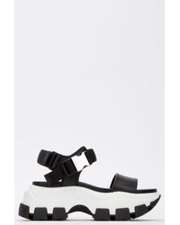 Prada Flat sandals for Women - Up to 73 