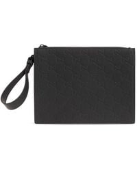 Gucci - Monogrammed Zipped Clutch Bag - Lyst