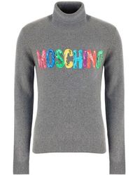 Moschino - Painted Logo Turtleneck Sweater - Lyst