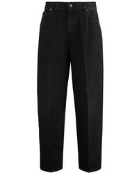 Totême - High-waisted Tapered-leg Jeans - Lyst