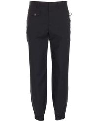 Moschino - Tag Pants - Lyst