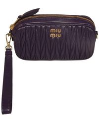 Miu Miu - Logo-plaque Zipped Clutch Bag - Lyst