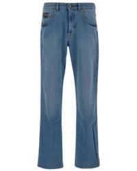 Versace - Logo-patch Wide-leg Jeans - Lyst
