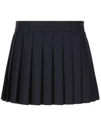 Miu Miu - Logo-patch Pleated Mini Skirt - Lyst