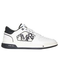 Amiri - Logo Embossed Low-top Sneakers - Lyst