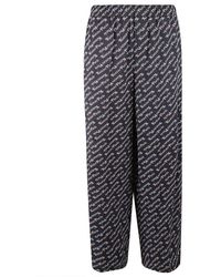 KENZO - Allover Logo Printed Wide-leg Trousers - Lyst