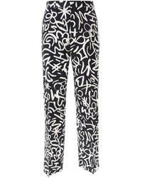Moschino - Allover Logo Printed Straight-leg Trousers - Lyst
