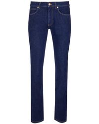 Versace - Logo Patch Mid Rise Jeans - Lyst