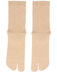 Womens Clothing Hosiery Socks Natural - Save 52% Maison Margiela Cotton Logo-print Ribbed Socks in Beige 