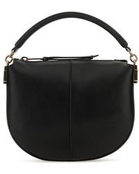 Tod's - T Timeless-plaque Top Handle Bag - Lyst
