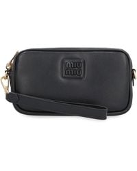 Miu Miu - Logo Detailed Zipped Clutch Bag - Lyst