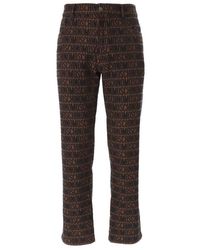 Moschino - Monogram Jacquard Slim-cut Jeans - Lyst