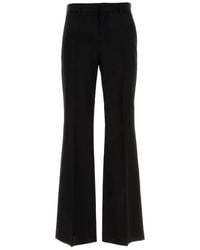 Versace - Logo Patch Flared Trousers - Lyst