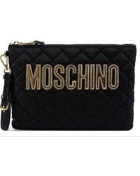 Moschino - Logo Plaque Quilted Clutch Bag - Lyst